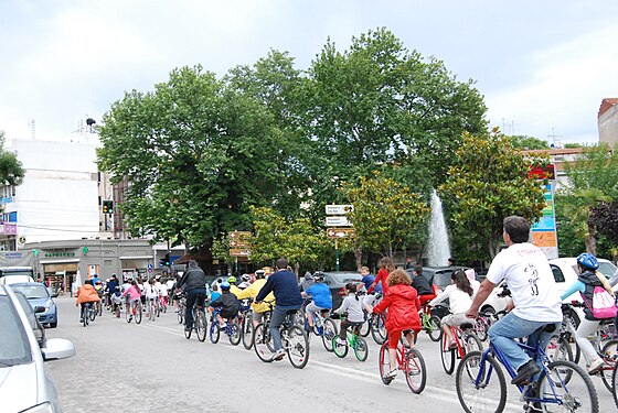 People on a guided bike tour in a town in northern Greece.