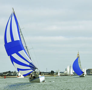 Spinnaker set for a broad reach, generating both lift with separated flow and drag.