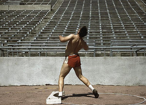 Shot putter at the University of Nebraska, 1942, showing the circle and stop board