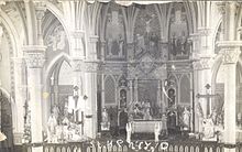 The church interior as it appeared before remodeling in the 1970s. St. Henry, O (16260464746).jpg