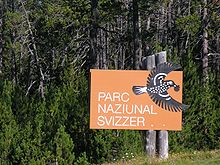 Panneau annonçant le Parc national suisse en romanche.