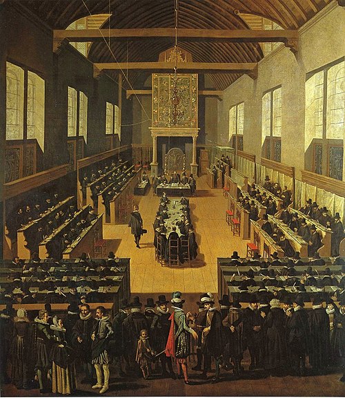 The Synod of Dort. The Arminians are seated at the table in the middle.[citation needed]