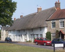 Thatched cottages in Stanford in the Vale before the August 2005 fire Thatched cottages at The Green, Stanford in the Vale, Oxfordshire.jpg