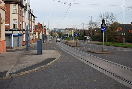 Infirmary Road as seen in 2008; the Kelvin flats previously stood on the right hand side of the road here.