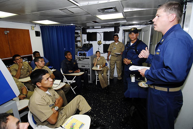 File:US Navy 090720-N-7092S-397 Chief Gunner's Mate Joshua Tolleson discusses maritime interdiction operation techniques with Colombian sailors during a subject matter expert exchange aboard the guided-missile frigate USS Kauffman (.jpg