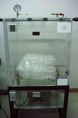 Vacuum chamber for testing leaks in inflatable cushion. ASTM D6653- Standard Test Methods for Determining the Effects of High Altitude on Packaging Systems by Vacuum Method Vacuum Chamber Package testing.jpg