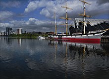 View from Govan across the River Clyde towards the Glenlee, the Riverside Museum and Glasgow Harbour apartments View from Govan (27476772593).jpg