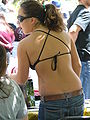 Image 37Woman wearing bikini top and jeans in USA, 2010. (from 2010s in fashion)