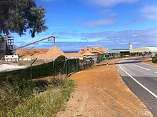 Woodchips waiting to be loaded at Albany Port in Western Australia Woodchips at Albany Port.JPG