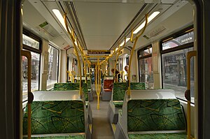 The E1-class interior, with passengers boarding the tram, December 2016