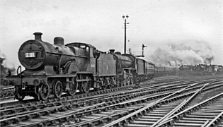 Trains spéciaux à l'occasion de la course hippique du Grand National à Aintree. La 40615 assiste une B1 ex-LNER.