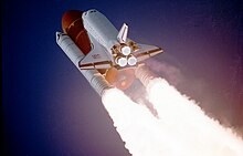 Space Shuttle Atlantis takes flight on the STS-27 mission on December 2, 1988. The Shuttle took about 8.5 minutes to accelerate to a speed of over 27,000 km/h (17000 mph) and achieve orbit. Atlantis taking off on STS-27.jpg