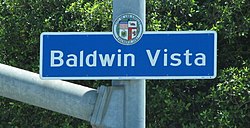 Baldwin Vista neighborhood sign located at the southwest corner of La Brea Avenue and Coliseum Street