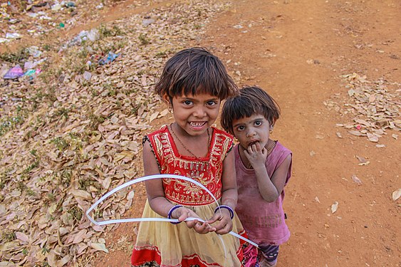 two sisters from tribal village posing for portraits