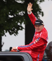 Elliott waves to fans during driver's introductions at Road America in 2018 BillElliott2018Johnsonville180.jpg