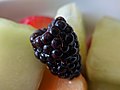 * Nomination A blackberry in a fruit salad. Taken with a clip on macro lens on a Nexus 5X. --Grendelkhan 22:48, 10 October 2017 (UTC) * Decline Not too bad fo a mobile with a clip-on but for a QI the DoF is too shallow. With this kind of subject, some focus stacking can also be expected. --W.carter 16:30, 13 October 2017 (UTC)
