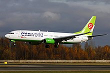 S7 Airlines Boeing 737-800 in Oneworld livery landing at Domodedovo International Airport. Boeing 737-8ZS, Oneworld (S7 - Siberia Airlines) AN2345277.jpg