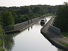 The Grand Union Canal passes over V6 Grafton Street between Bradville and New Bradwell on the modern Bradwell Aqueduct, built specifically to accommodate it. BradwellAqueduct-GUC.JPG