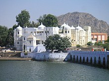 Foot bridge of arches to cross the inlet channel to the lake during parikrama of ghats and temples on ghats