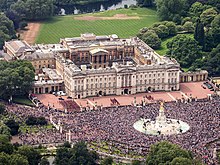 Buckingham Palace, in London, England, is the monarch's principal residence. Buckingham Palace aerial view 2016 (cropped).jpg