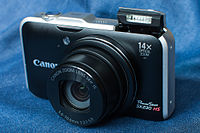 Canon Powershot SX230 HS Kamera vorne.JPG