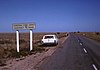 A road sign near Broken Hill reminding the time zone difference