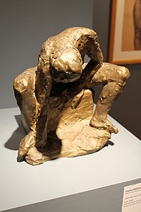 Vers 1906 : Charles Despiau, Femme nue assise se lavant les pieds, en bronze doré.