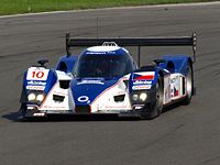 An Aston Martin-powered Lola B08/60 run by Charouz Racing System and backed by Aston Martin Racing Charouz Aston Martin Front.jpg