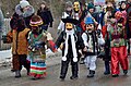 File:Children dressed as various personages including Jew, Bear and Malanka walking at traditional Pereberia festival,Ukraine.jpg