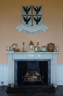 The college coat of arms in the Community Reception Room at Clongowes Wood College SJ ClongowesCrest.png