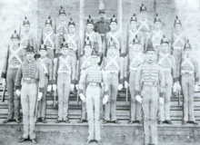 Believed to be J.T. Murfee (middle of the back row) with cadets of B company Co. B, Howard Cadet Corps.png