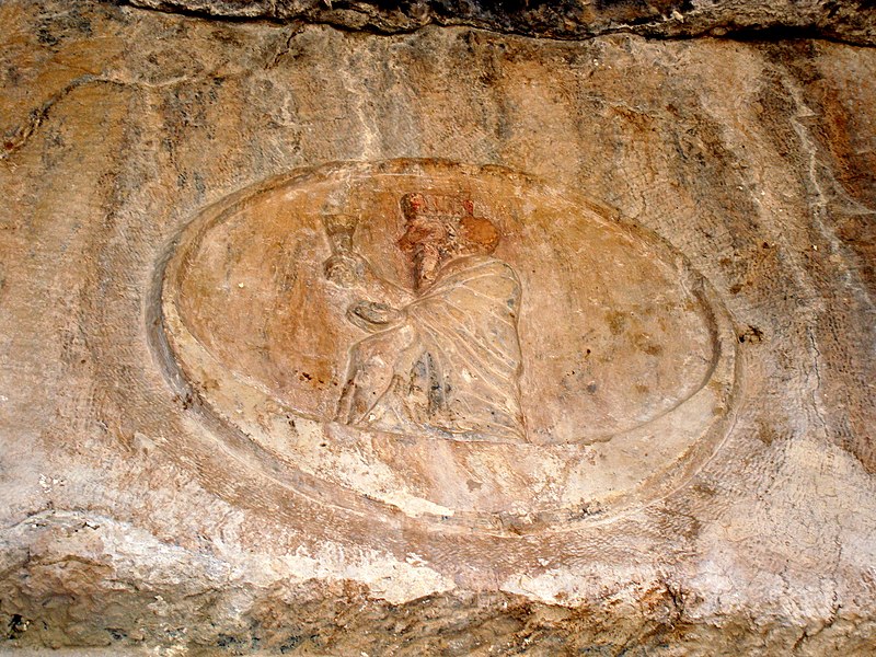 File:Detail. Divine emblem, depicting a god sitting on a crescent. The rock-cut tombs of Qizqapan, Sulaymaniyah Governorate, Iraqi Kurdistan. Probably Achaemenid (6th-5th century BCE) rather than Median.jpg