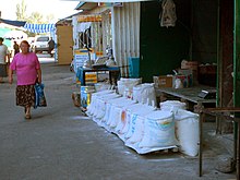 A variety of types of flour and cereals sold at a bazaar in Bishkek, Kyrgyzstan E8088-Alamudun-Bazaar-flour-vendor.jpg