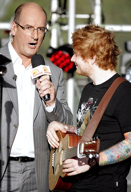 Koch interviewing singer Ed Sheeran