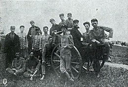 Students with an artillery piece Escola Militar do Realengo peca de artilharia.jpg