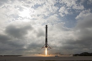 Falcon 9 first stage lands on LZ-1 (32153432924).jpg
