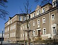 School complex of two buildings with a connecting structure