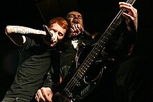 Former singer Frank Carter (left) and bassist Stuart Gili-Ross (right) in 2007 Gallowsband.jpg