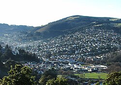 Looking across the Gardens Corner at the mouth of the valley towards Opoho from Prospect Park. The Gardens Ground is clearly visible at the lower right.