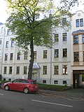 Apartment building in closed development with front garden