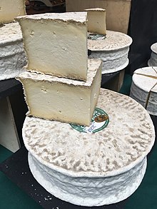 Wheels of unpasteurised Caerphilly cheese Gwynedd Caerphilly.JPG