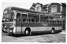 A Bristol LH with Panorama Elite body; above the windscreen is the destination box mounted in a Bristol dome Harwich & Dovercourt Coaches ex-Grey Green BRISTOL LH WLT578G at Harwich Town Station 1978.jpg