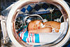 Infant in an incubator