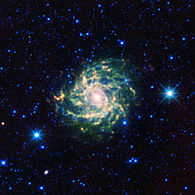 IC 342, a normally obscured galaxy visible through infrared imaging