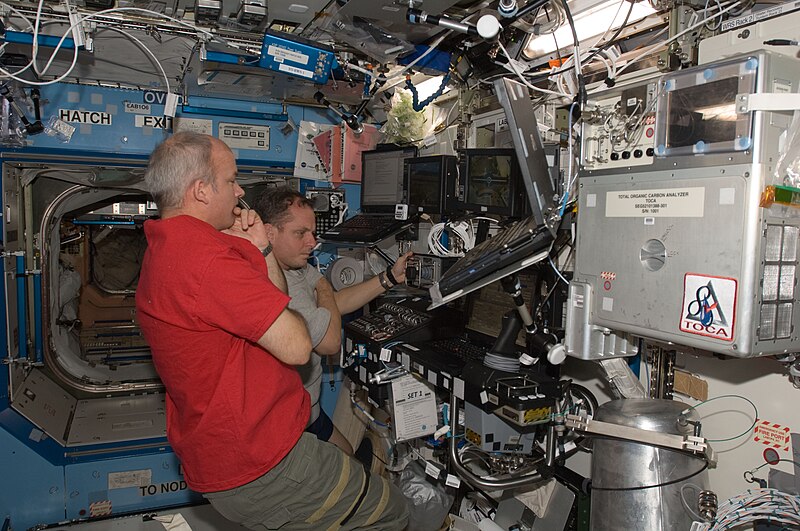 File:ISS-22 Jeffrey Williams and T.J. Creamer work the controls of the Canadarm2 in the Destiny lab.jpg