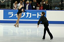 A throw jump in mid-air Jessica Miller & Ian Moram Throw Jump - 2006 Skate Canada.jpg