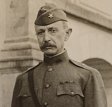January 1919 sepia-toned head and shoulders photo of U.S. Army Brigadier General John S. Winn in dress uniform, standing outdoors in France