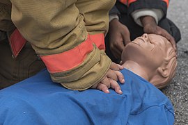 File:Joint Base Andrews Fire Explorer Academy cadets perform CPR on a training dummy.jpg