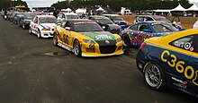 Competitors in the KONI Challenge on a pre-grid at New Jersey Motorsports Park in 2008 KONI Challenge New Jersey.jpg