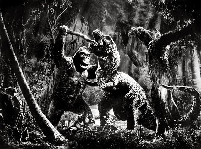 Promotional image featuring Kong battling the Tyrannosaurus